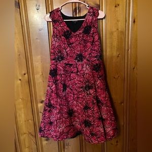 Size 6 women’s floral black & Red dress by George with a black slip liner inside